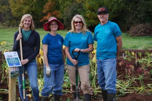 Catie Wytychak, Susan Bryan, Mary Sheaffer-Manthey and Frank Commisky planting a new rain garden at Thurston Elementary