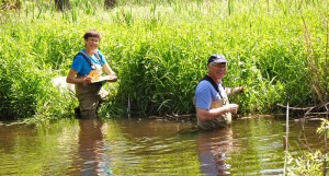 Volunteers Mary Bajcz and Larry Scheer monitoring at Norton Creek