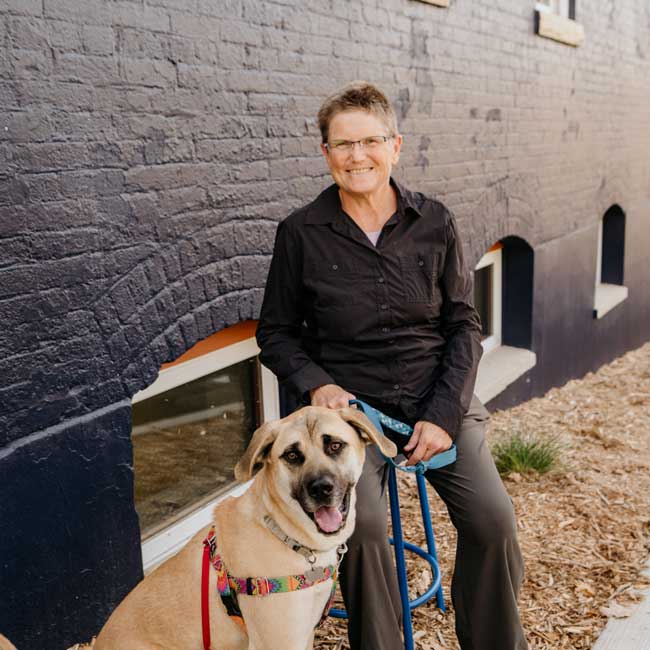 Photo of Kris Olsson with rescue dog