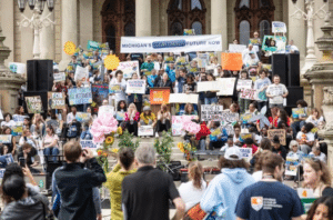 Photo of climate change rally on the steps of the Michigan Capitol in Lansing on September 26, 2023