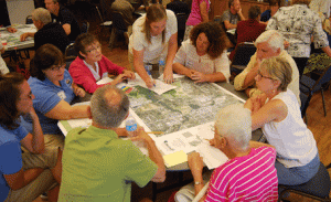 group at table reviewing map